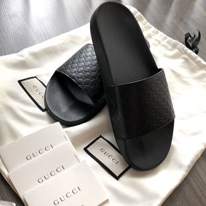 Gucci
Black Men's Leather and Rubber Slides Sandals 8